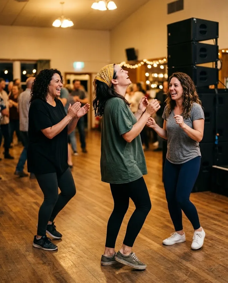 Mulheres a dançar dancehall e a rir juntas